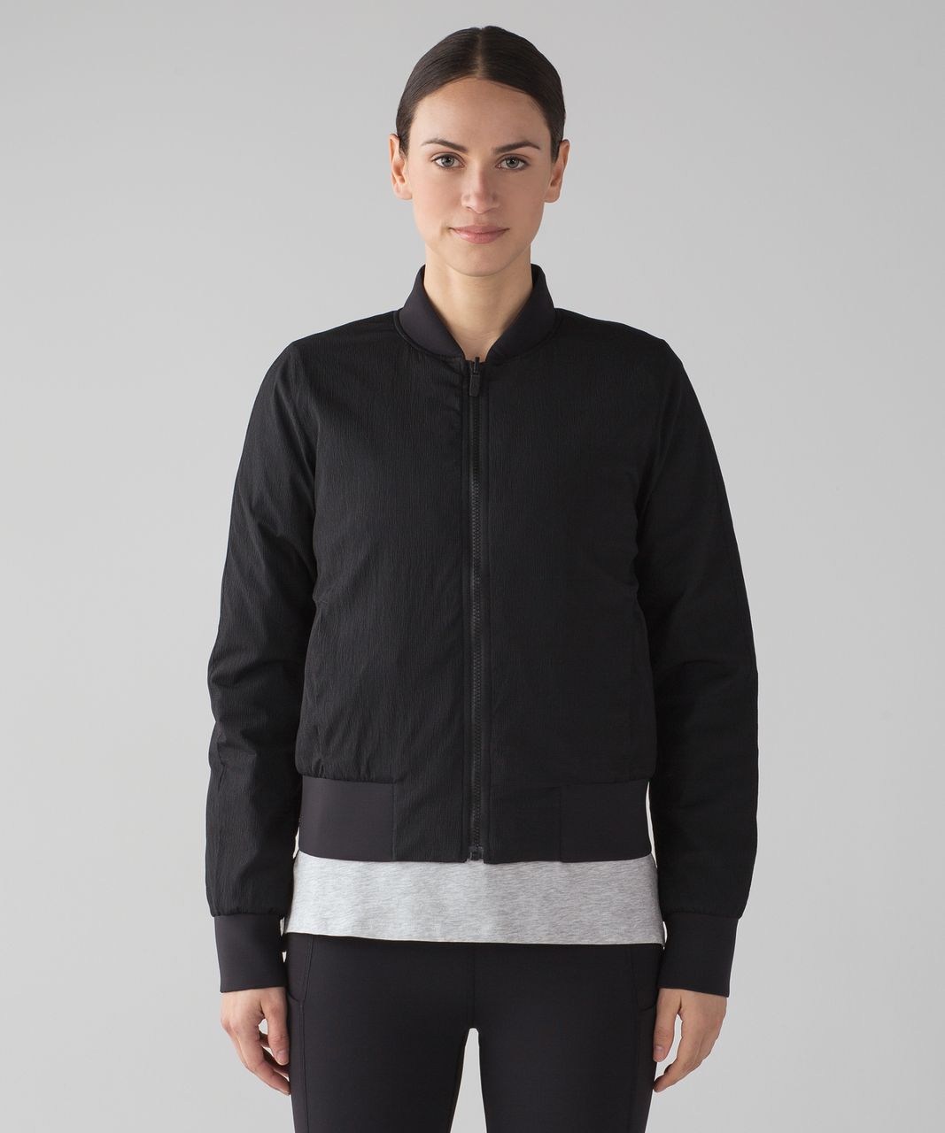 shoppers say this reversible puffer jacket is an affordable version  of Lululemon's Bomber